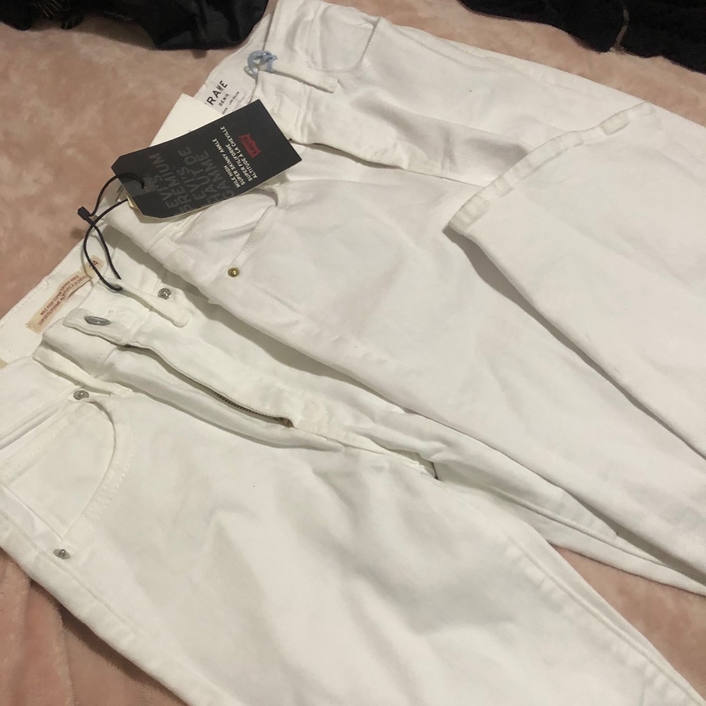 2 white jeans (24&25)